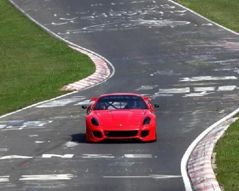 Cover for Ferrari takes the Nordschleife record. Not.