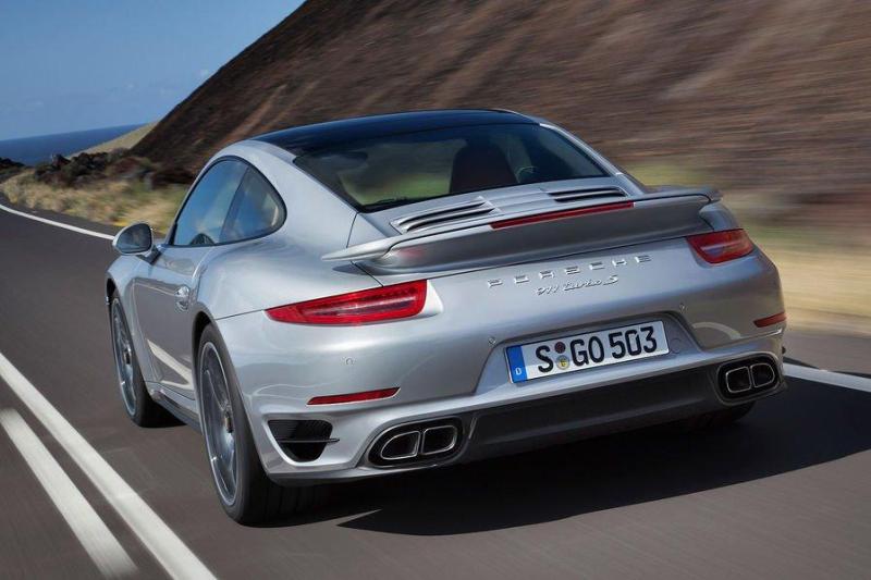 Cover for Porsche reveals next generation 911 Turbo, downplays power ratings?